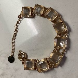 Clear square cut crystal elements 8 stones set in goldtone plating  8-11” length